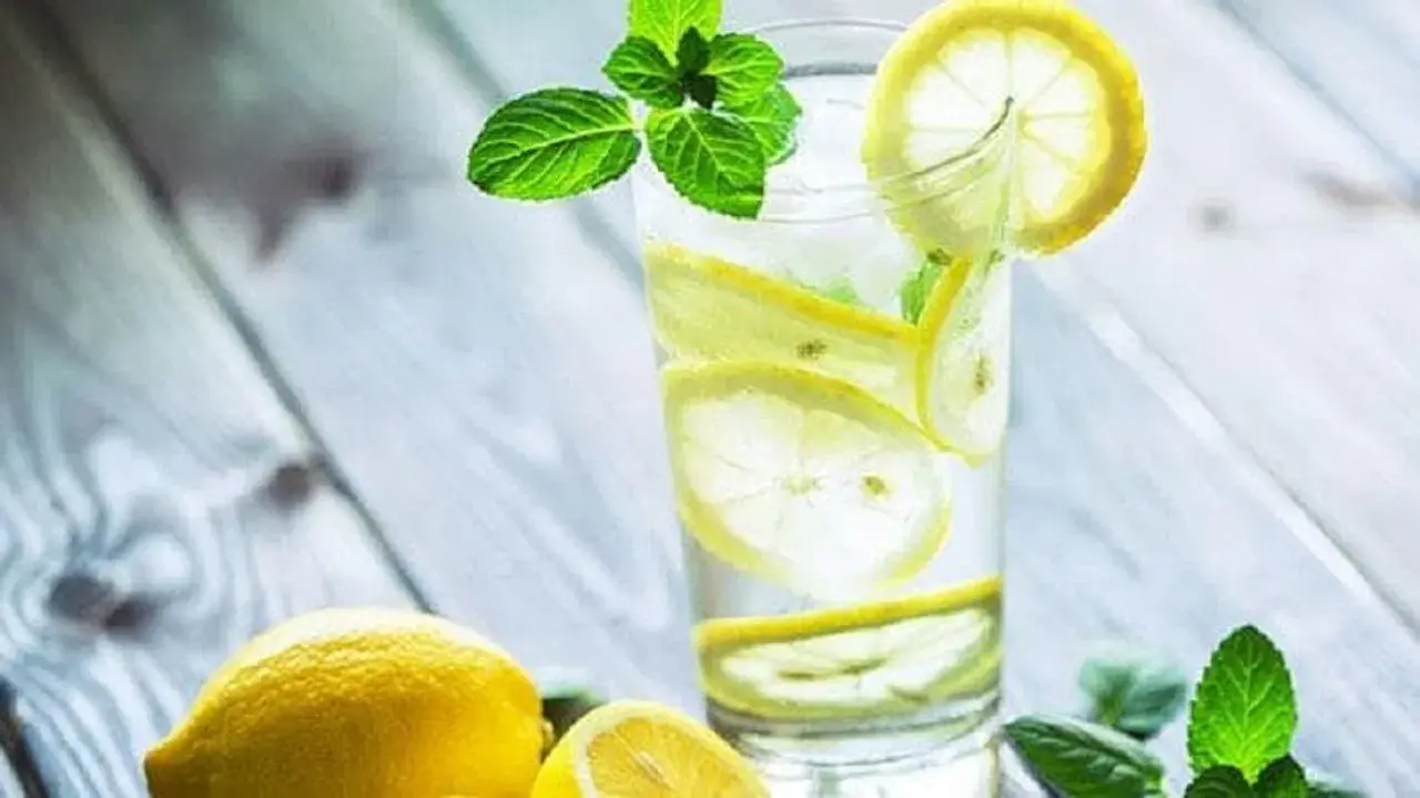 Drinking Lemon Water In Summer